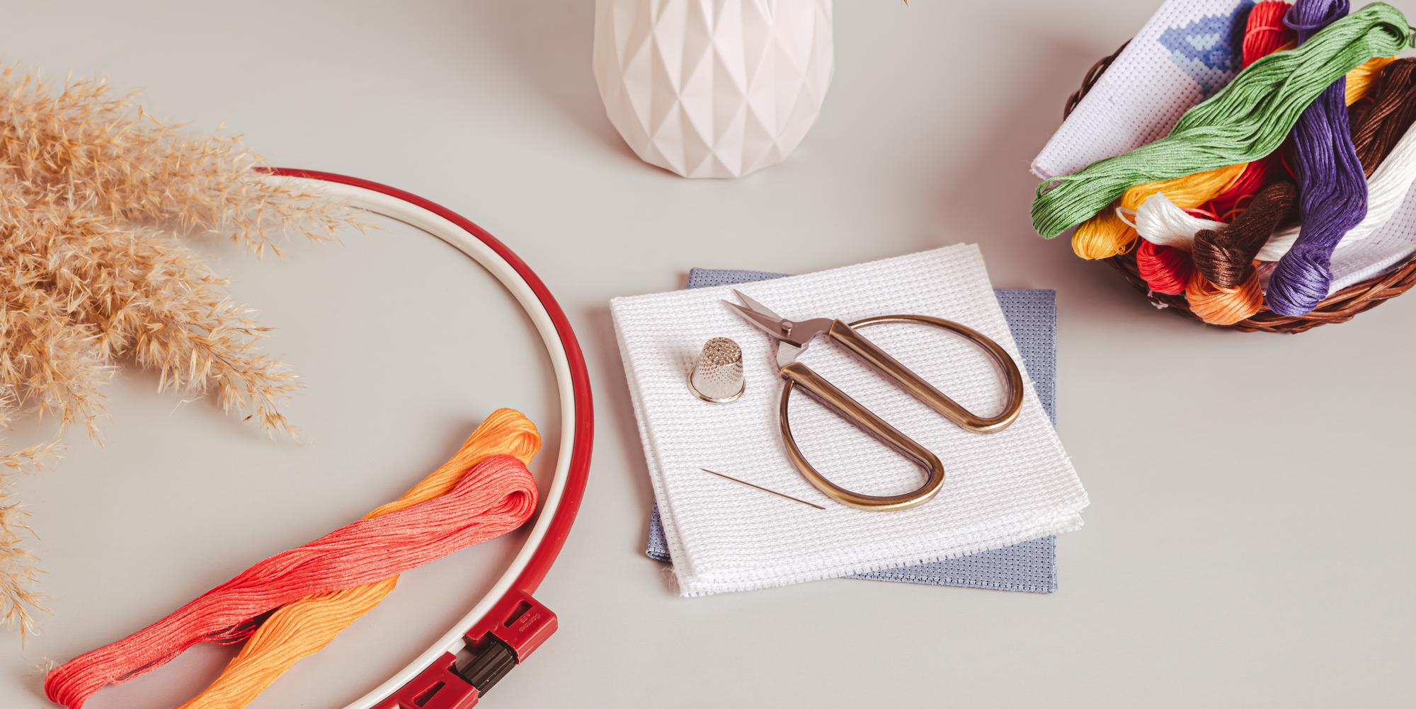 Workshop table with hoops and thread