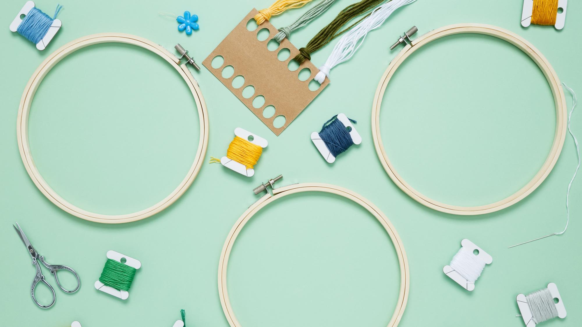 Selection of threads and hoops arranged on table